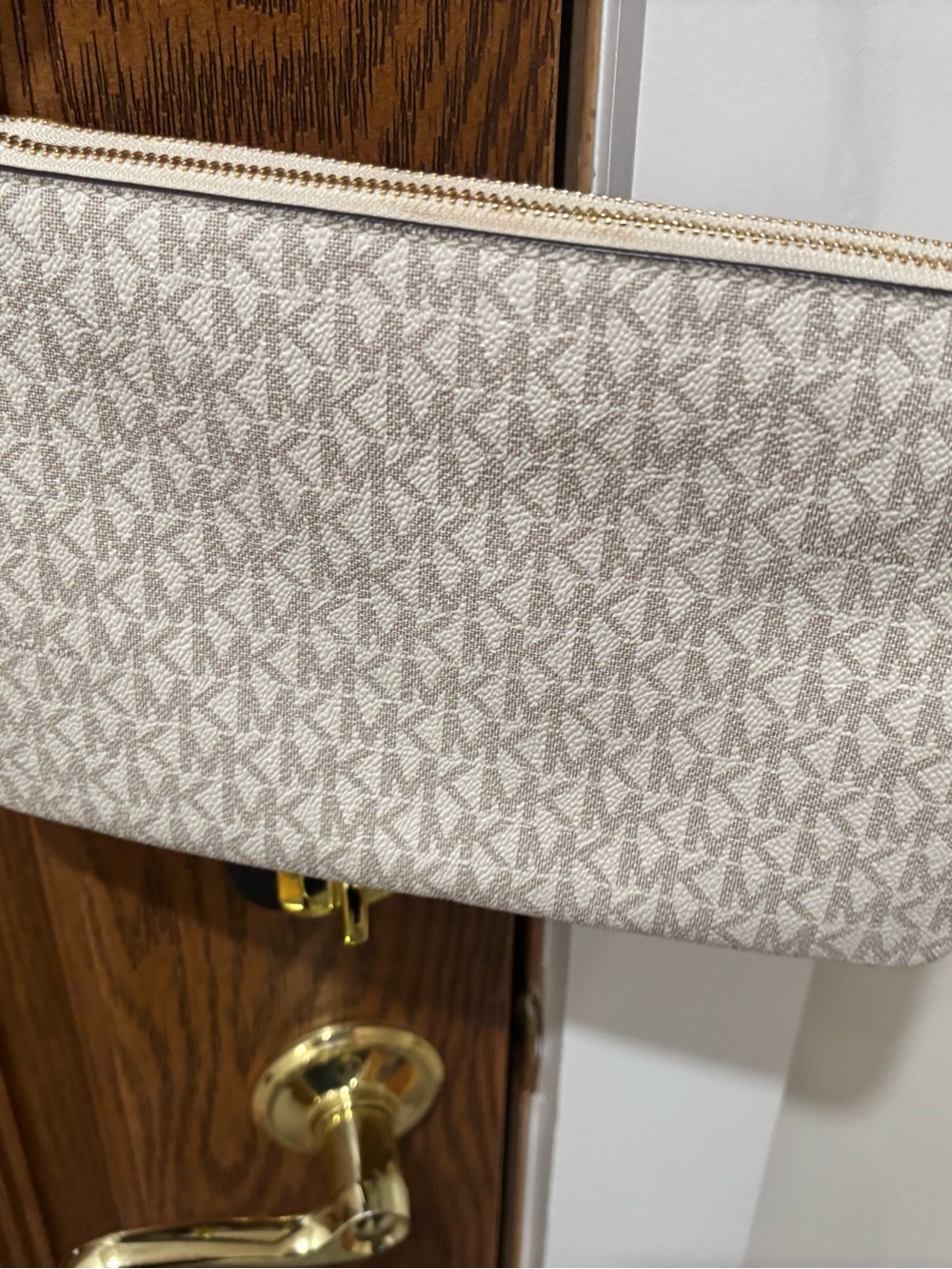 Michael Kors Cream Logo Zip Wristlet with Gold Hardware